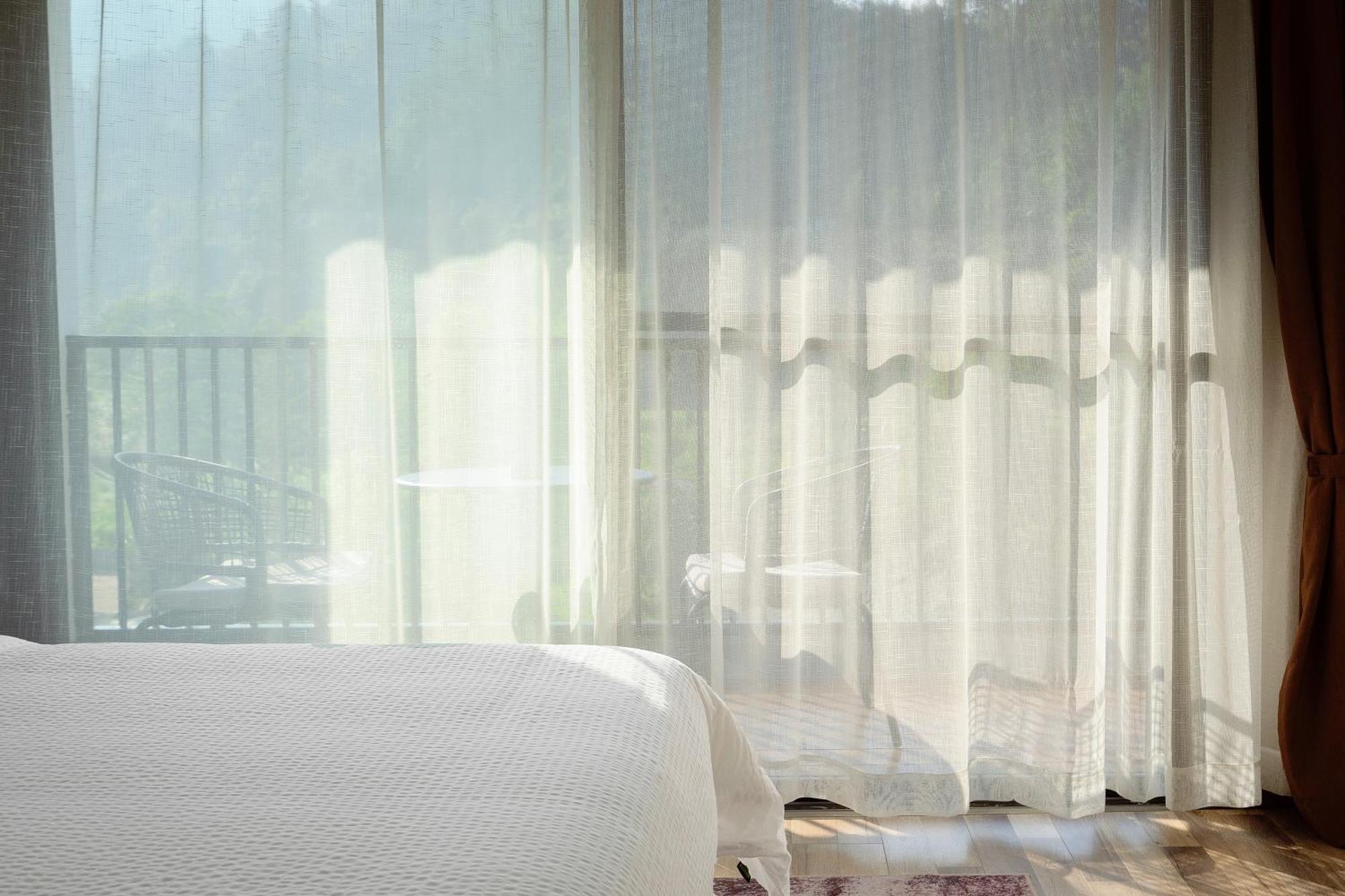Whispering Mountains Boutique Hotel Чжанцзяцзе Екстер'єр фото
